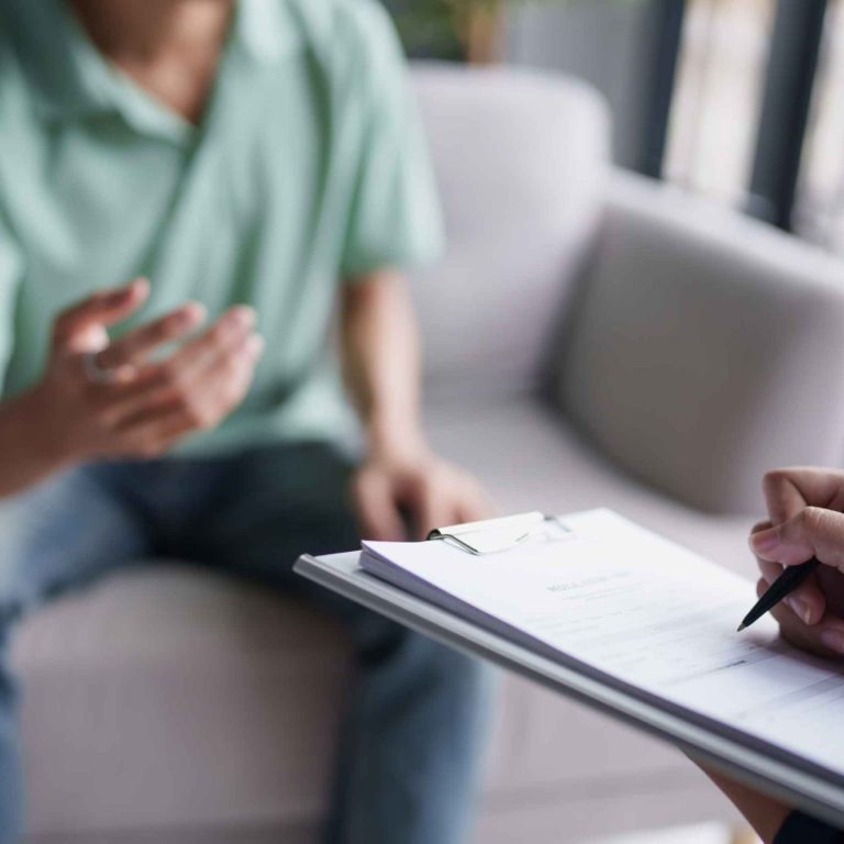 sad-male-sitting-sofa-patient-discussing-mental-health-issues-with-psychologist-depressed-asian-man-mental-health-treatment-2